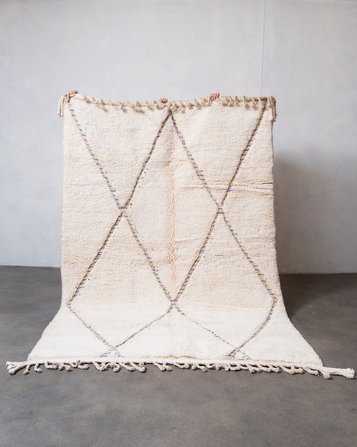 Modern, designer, handcrafted Berber rug from Morocco. Beniourain carpet with beautiful colours and patterns and fluffy wool texture.
